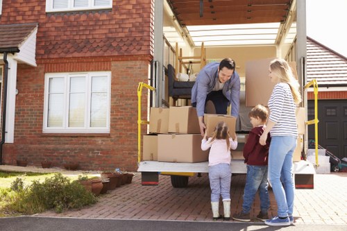 Removal team packing and protecting household items during a safe move