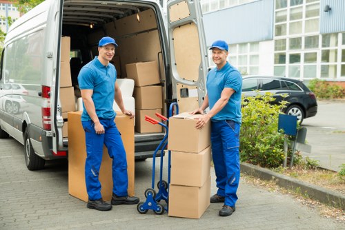 Student move preparation with boxes and furniture in Earls Court
