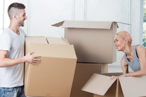 Packed boxes and furniture ready for urgent moving service in Earls Court