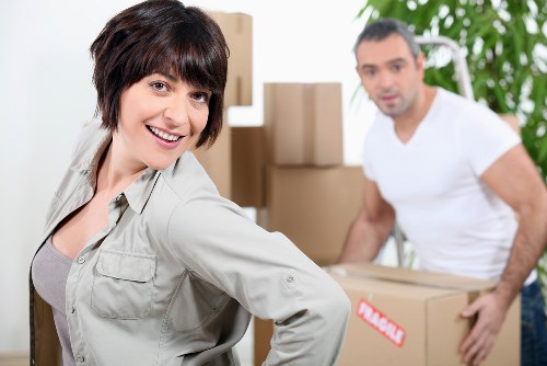 A local moving team handling boxes and furniture for Earls Court customers