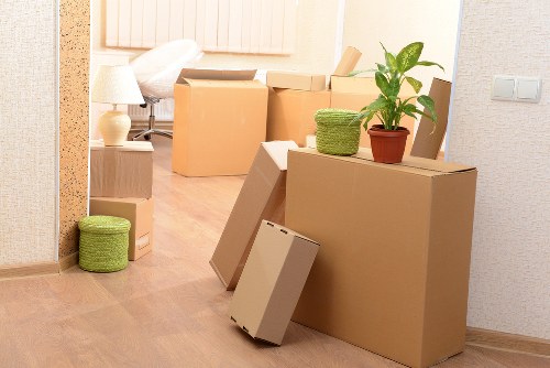 Careful handling of household furniture during a local home move in Earls Court