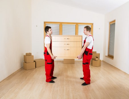 Moving professionals confirming booking details and service scope